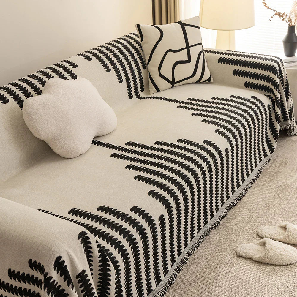 Manta para Sofá Jacquard com franjas em sala estilo escandinavo com luminária - Vittara Decor