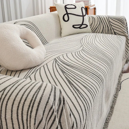 Manta para Sofá em Chenille cinza cobrindo sofá de canto em formato de L - Vittara Decor