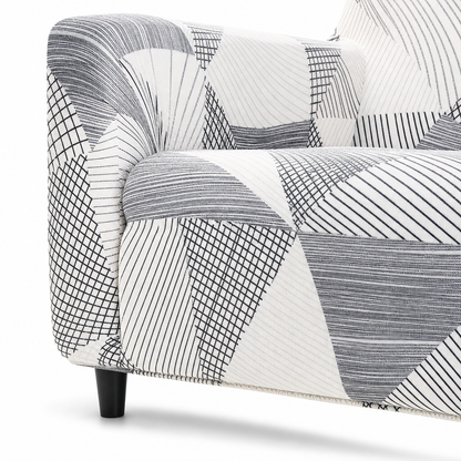 Detalhe do encaixe elástico da capa de sofá estampada na base do sofá - Vittara Decor