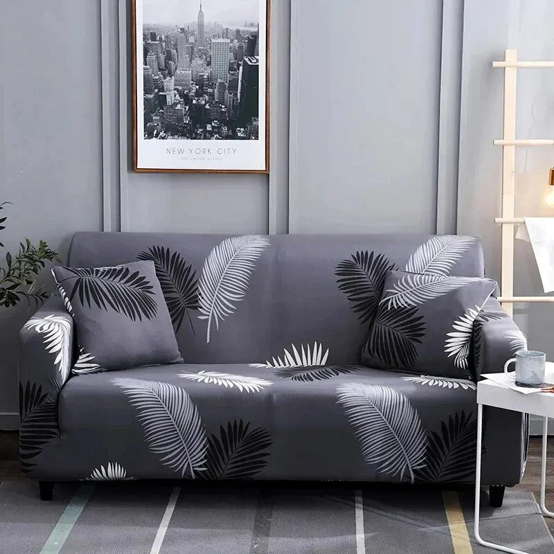 Capa de Sofá Elástica Estampada com estampa de folhas cinzas em sala contemporânea - Vittara Decor