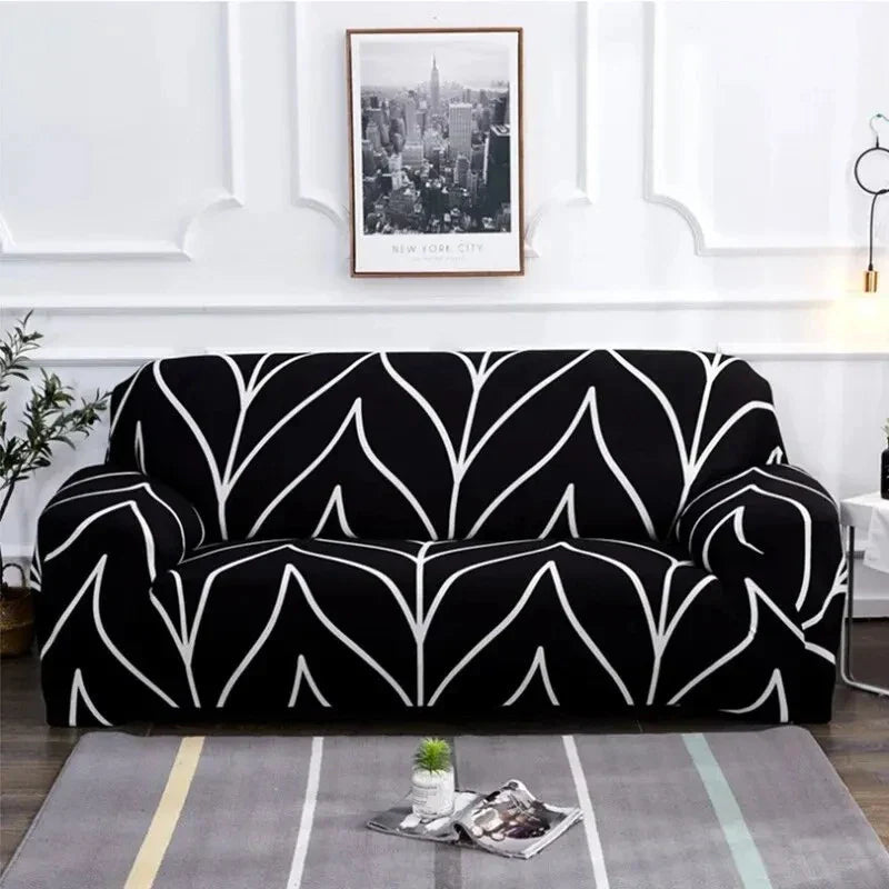 Capa de Sofá Elástica Estampada com folhas pretas e brancas em sala moderna - Vittara Decor