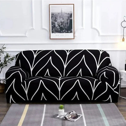 Capa de Sofá Elástica Estampada com folhas pretas e brancas em sala moderna - Vittara Decor