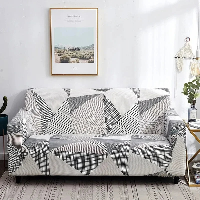 Capa de Sofá Elástica Estampada com padrão geométrico branco e cinza em sala minimalista - Vittara Decor