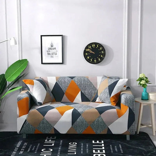 Capa de Sofá Elástica Estampada preta com folhas brancas em sala de estar branca - Vittara Decor