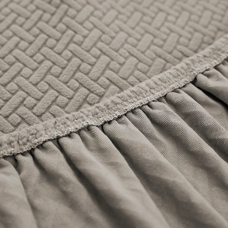 Detalhe do elástico na borda inferior da Capa de Sofá Elástica Jacquard - Vittara Decor