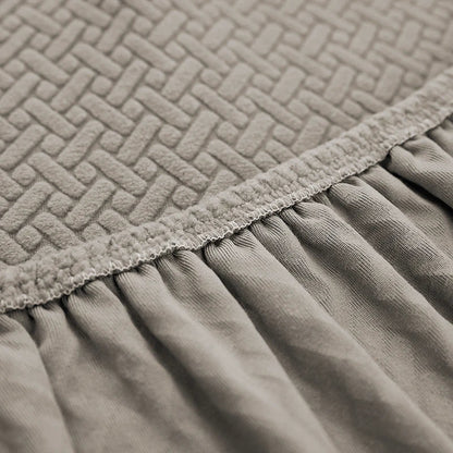 Detalhe do elástico na borda inferior da Capa de Sofá Elástica Jacquard - Vittara Decor