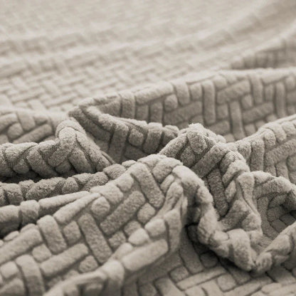 Detalhe da textura jacquard em relevo da Capa de Sofá Elástica - Vittara Decor