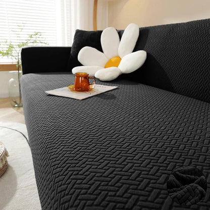 Capa de Sofá Elástica Jacquard preta em sala moderna de decoração neutra - Vittara Decor