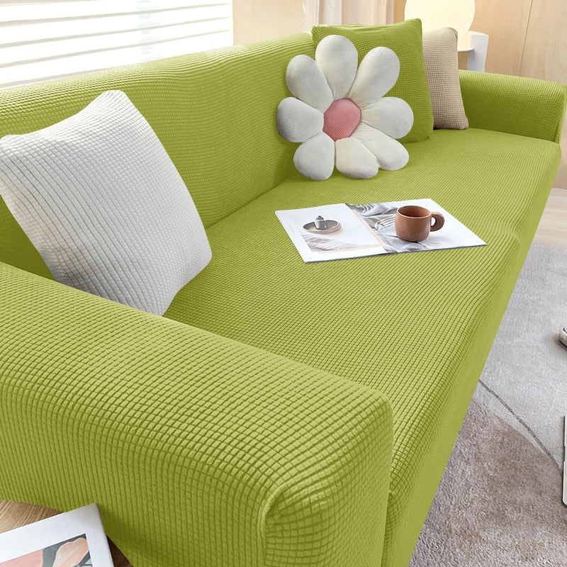 Detalhe do acabamento premium da capa de sofá ajustável em jacquard - Vittara Decor
