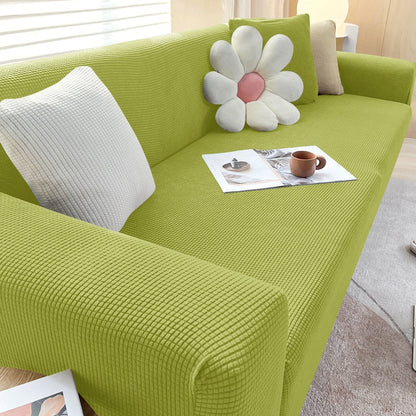 Detalhe do acabamento premium da capa de sofá ajustável em jacquard - Vittara Decor