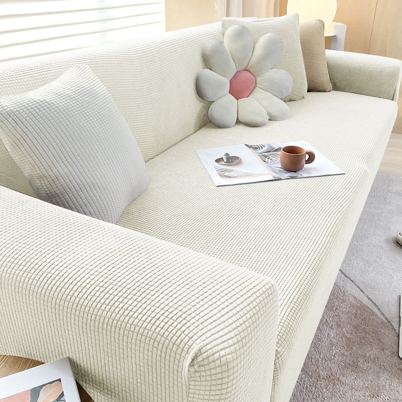 Detalhe de costura da capa de sofá ajustável em jacquard resistente - Vittara Decor