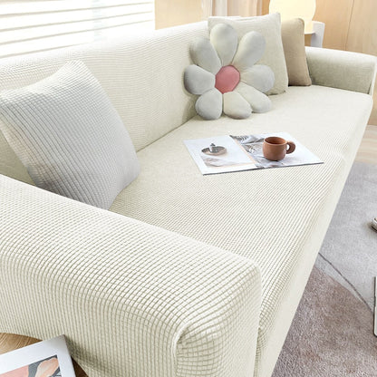 Detalhe de costura da capa de sofá ajustável em jacquard resistente - Vittara Decor