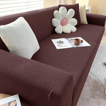 Detalhe da borda da capa de sofá ajustável em jacquard resistente - Vittara Decor