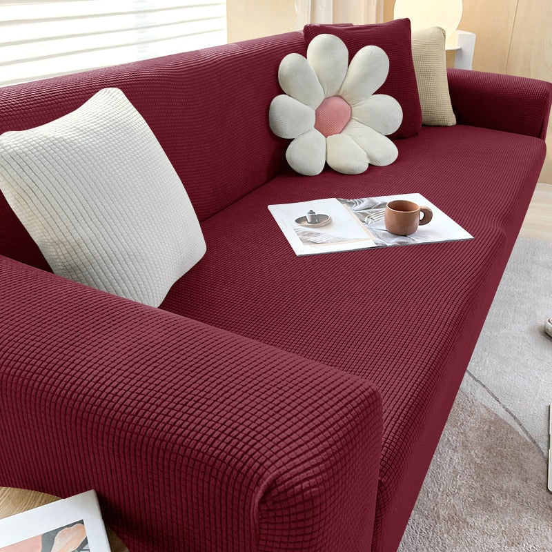 Capa de sofá ajustável em jacquard resistente mostrando variação de cor - Vittara Decor