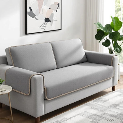 Capa de sofá antiderrapante cinza com borda bege em sala contemporânea — Vittara Decor