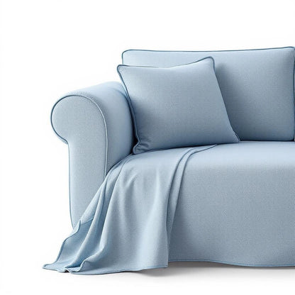 Capa de sofá Jacquard azul claro dobrada fundo branco - Vittara Decor