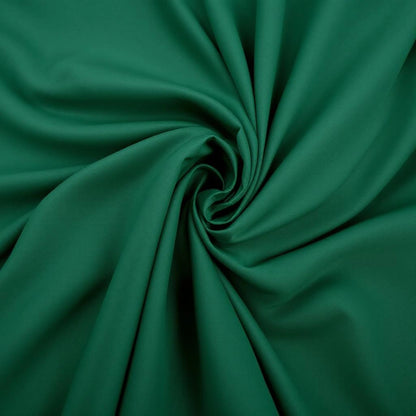 Capa de sofá Jacquard verde pinho dobrada fundo branco - Vittara Decor