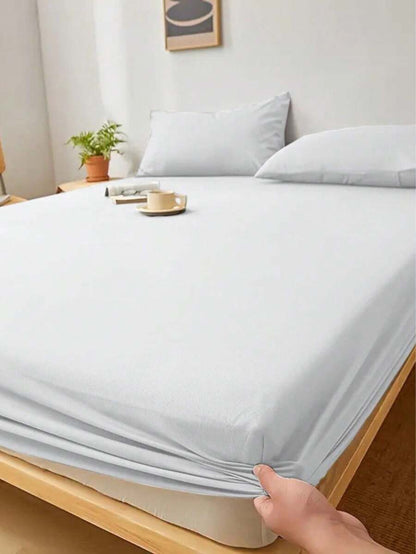 Jogo de Cama 400 Fios liso branco em quarto claro com luz natural - Vittara Decor