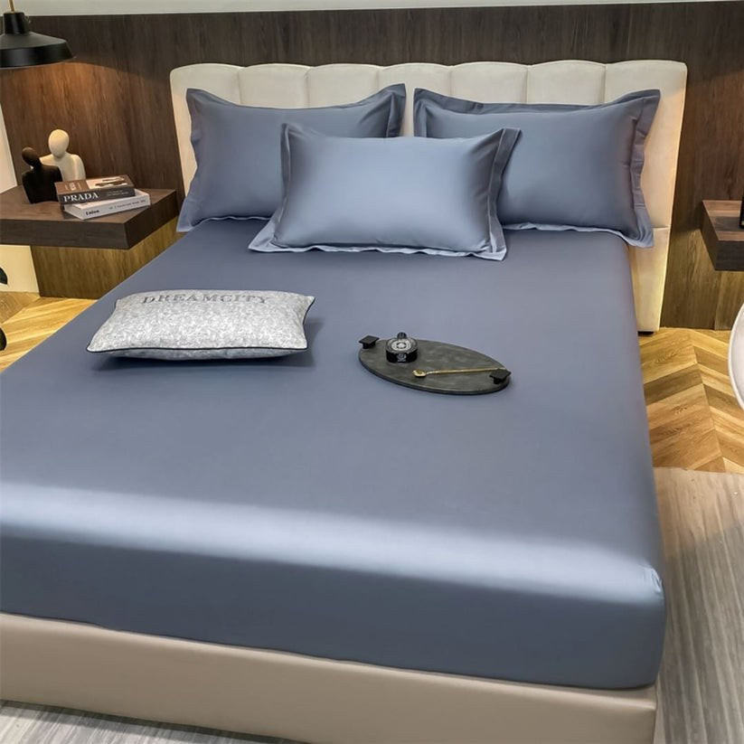 Jogo de cama de algodão egípcio azul acetinado no quarto - Vittara Decor