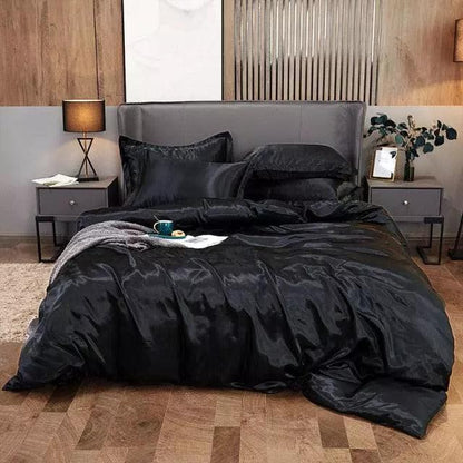 Jogo de cama de cetim preto acetinado em quarto escuro - Vittara Decor