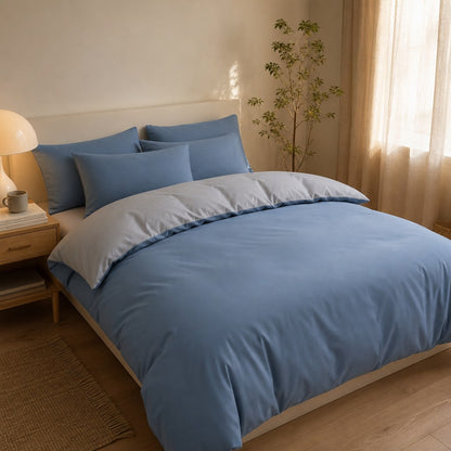 Jogo de cama nórdico azul com livros na mesa de cabeceira - Vittara Decor
