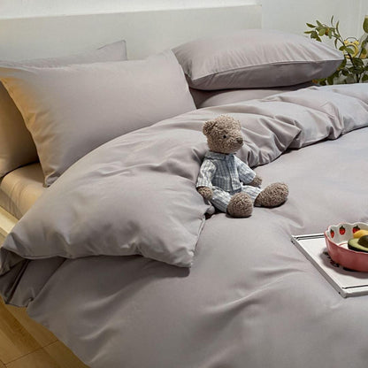 Jogo de cama nórdico liso cinza em quarto aconchegante - Vittara Decor