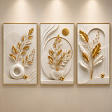 Modelo Vasos e Folhas Douradas: três quadros florais em bege e dourado na parede - Vittara Decor
