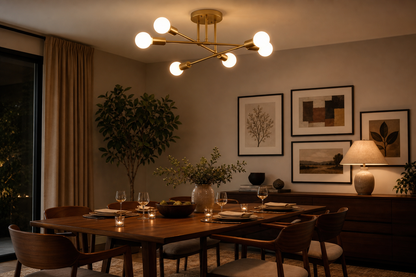 Lustre LED Nórdico dourado de 6 luzes sobre mesa de jantar em clima de jantar à noite - Vittara Decor