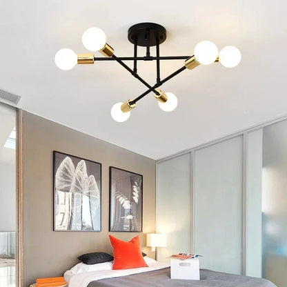 Lustre LED Nórdico preto de 6 luzes sputnik no teto de um quarto aconchegante - Vittara Decor