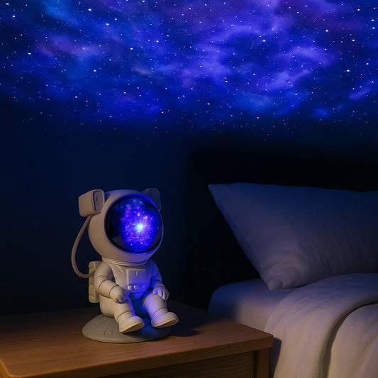 Projetor de galáxia astronauta projetando estrelas e nebulosa no teto de quarto de casal ao entardecer - Vittara Decor